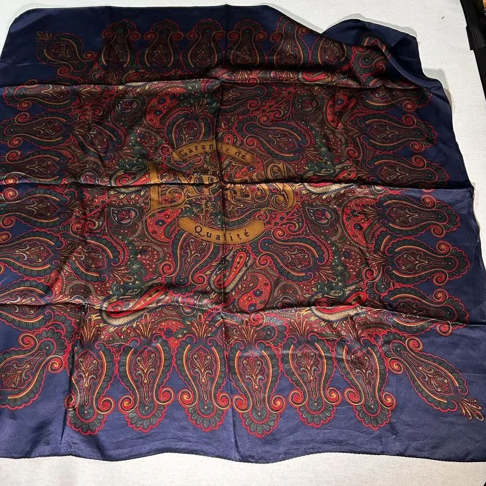 VTG Express silk scarf featuring a red and blue paisley pattern